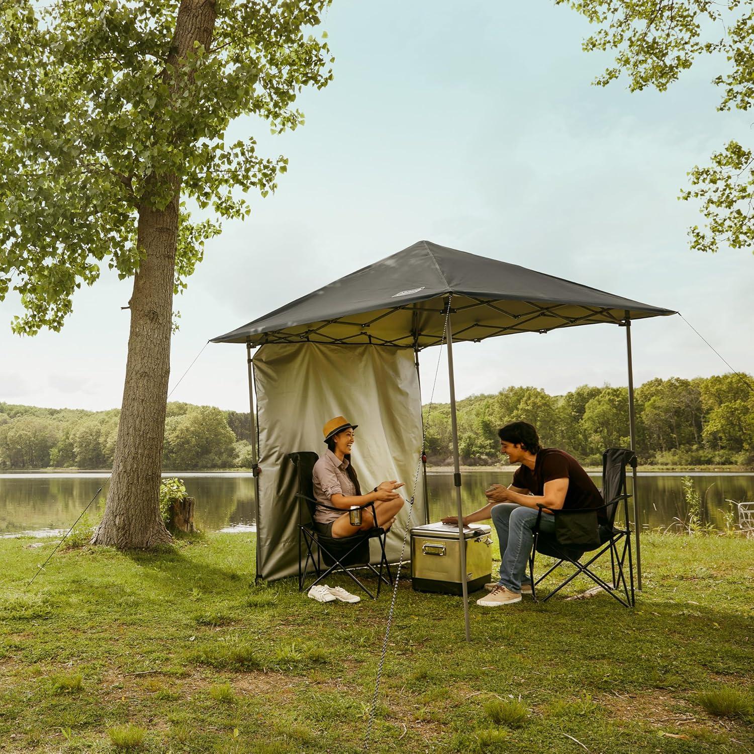imageColeman Oasis Lite PopUp Canopy Tent with Side Wall Attachment Portable Shelter with Easy Setup ampamp Takedown Wheeled Carry Bag Included 7x710x10ft SizesBlack