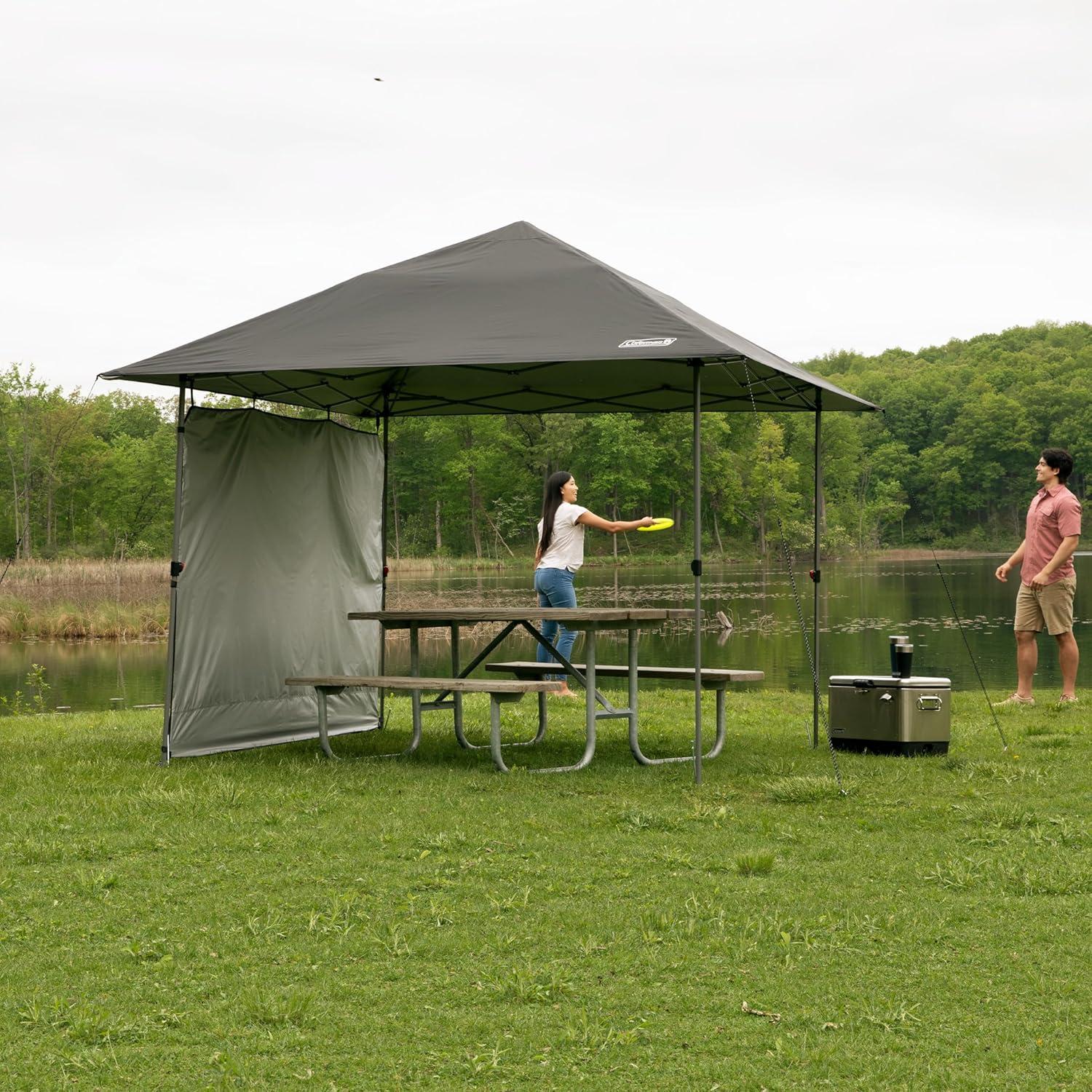 imageColeman Oasis Lite PopUp Canopy Tent with Side Wall Attachment Portable Shelter with Easy Setup ampamp Takedown Wheeled Carry Bag Included 7x710x10ft SizesBlack