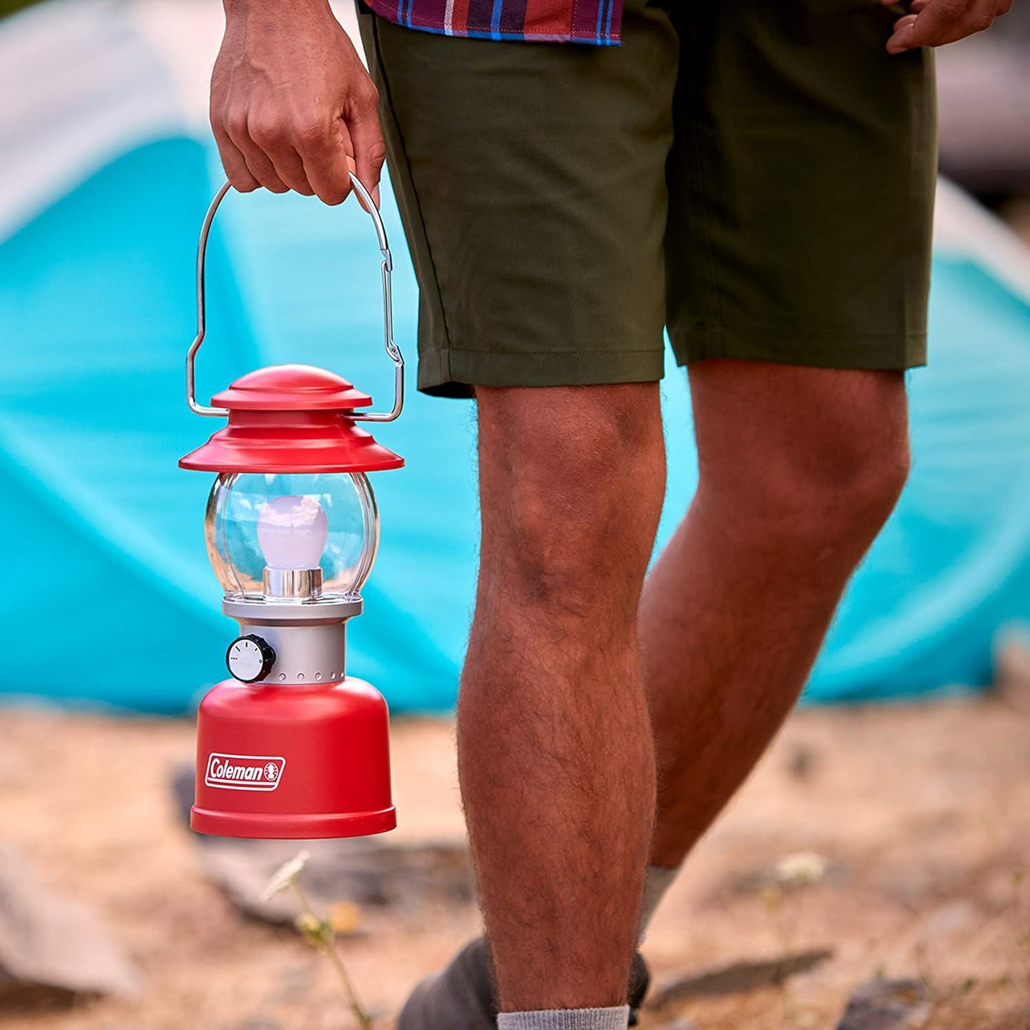 imageColeman Classic LED Lantern 300L500L Handheld Lantern with Hanging Handle Durable ampamp WaterResistant with Long Runtime for Camping Emergencies ampamp atHome UsageRed