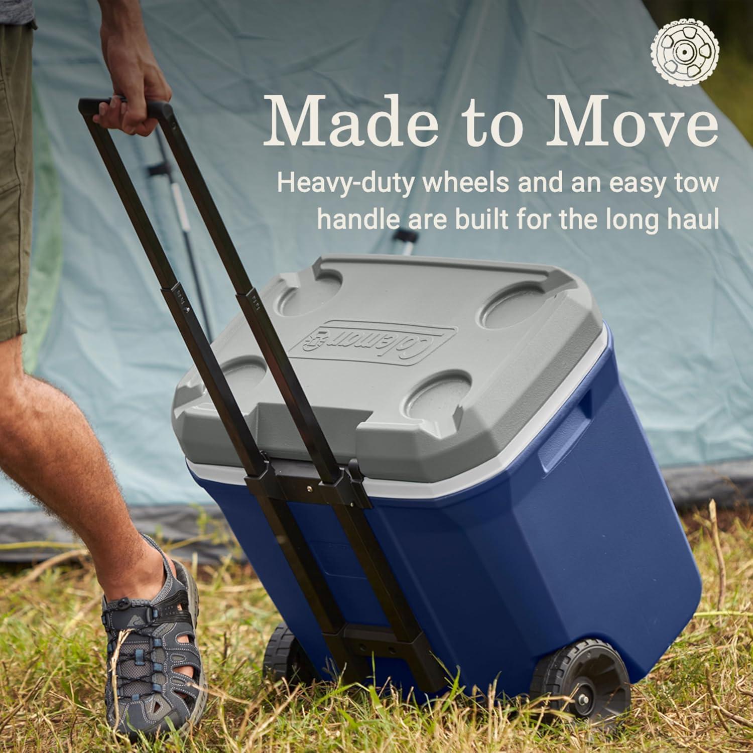imageColeman Classic Series Insulated Portable Rolling Cooler with Wheels LeakResistant Outdoor Hard Cooler Keeps Ice up to 5 Days 100QuartTwilight