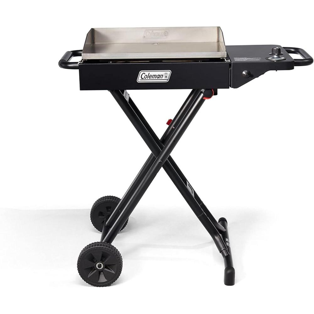 imageColeman Roadtrip Griddle 19quot or 24quot Propane Griddle with Instastart Ignition Even Heat Distribution Grease Tray ampamp Optional Lid Portable with Scissor Legs and WheelsBlack